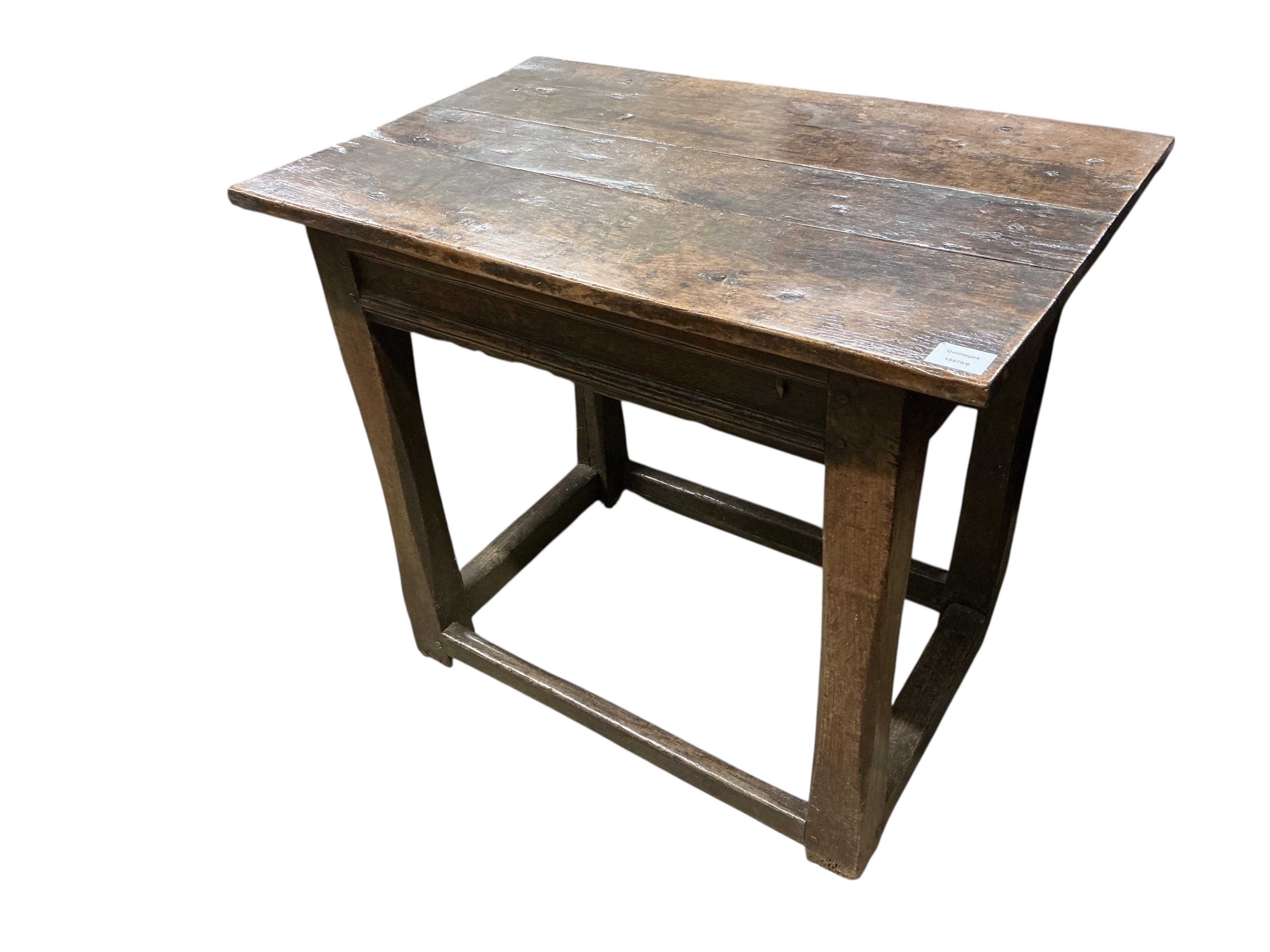 A small late 17th century oak side table, the rectangular top on square chamfered supports, width 80cm, depth 53cm, height 71cm